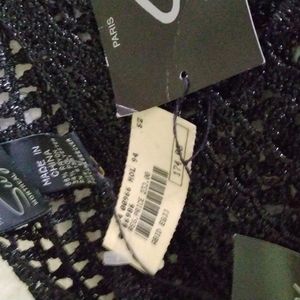 I am selling a new Suzelle black shimmery knit tunic